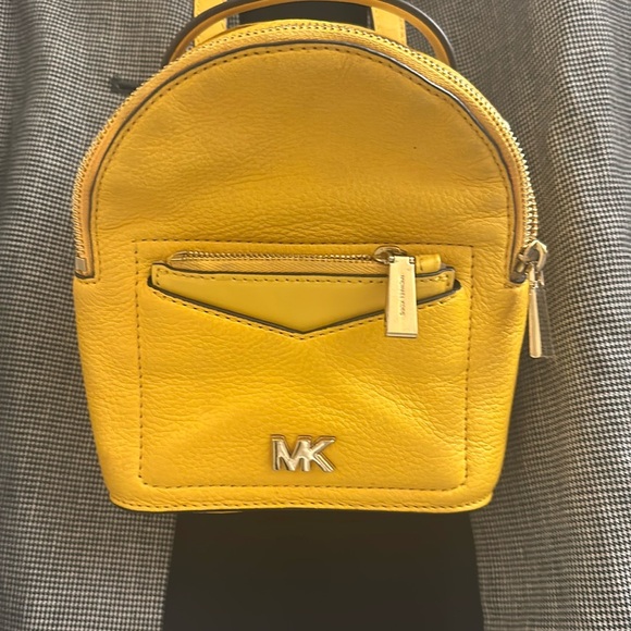 MICHAEL KORS YELLOW MINI BACKPACK CROSSBODY - Picture 1 of 8
